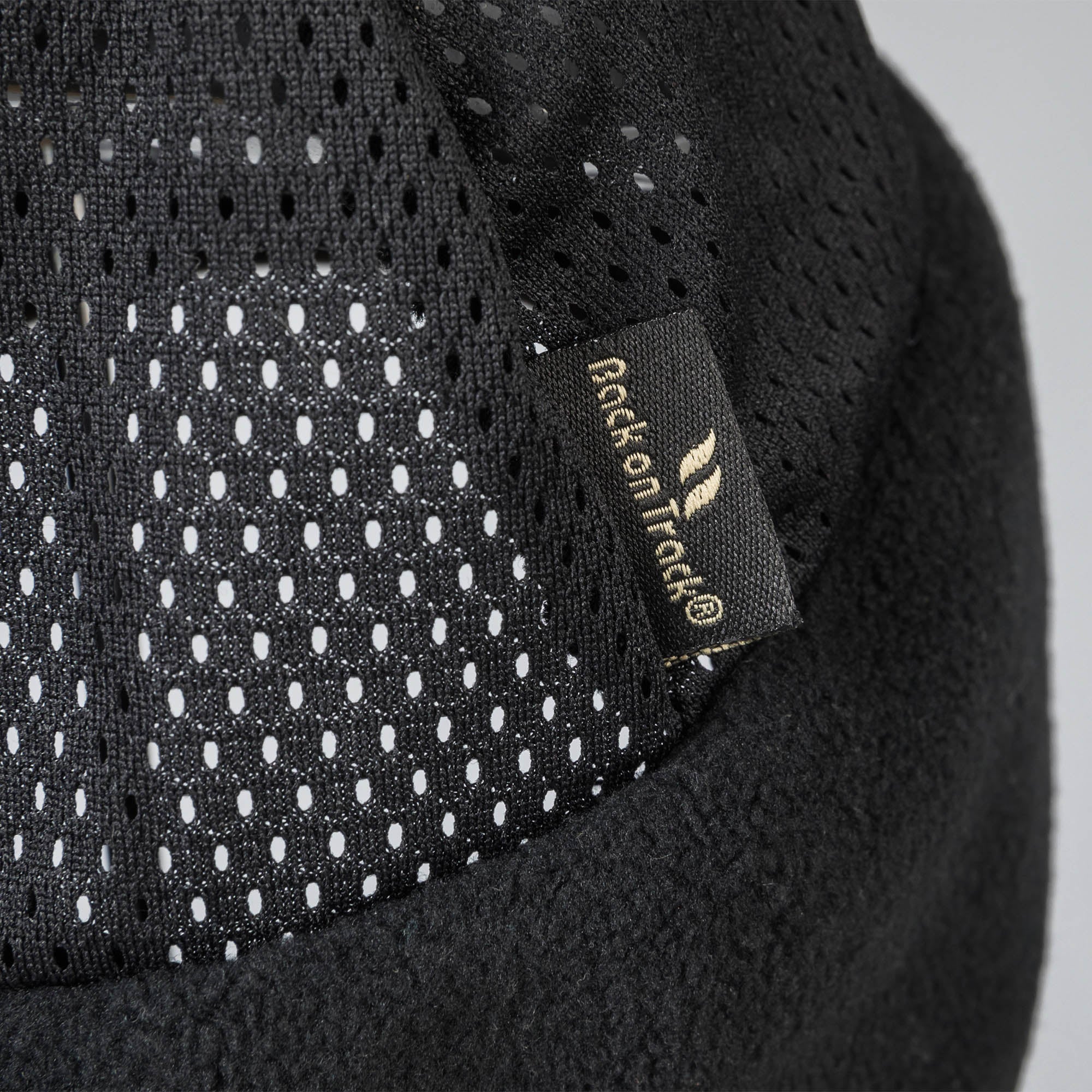 Back on Track fleece headband with mesh top and Iontex® lining for breathability, warmth, and comfort