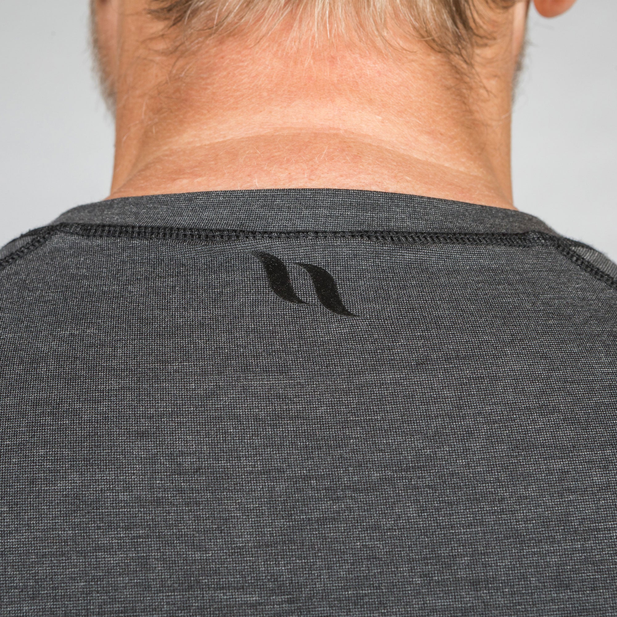 Back on Track Issac men's long sleeve base layer with athletic fit, breathable fabric, and infrared technology support