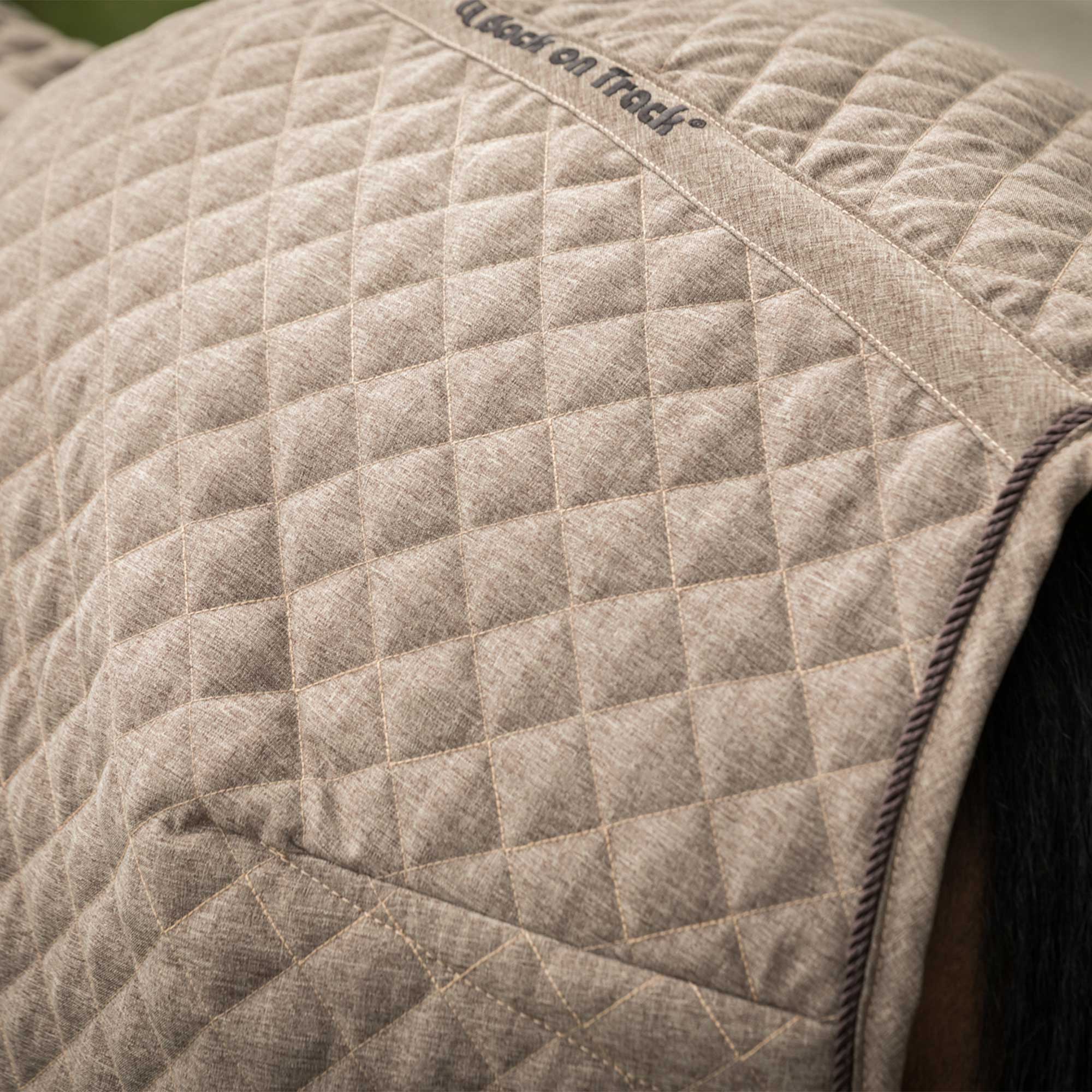 Haze Horse Show Quilt Cooler with quilted fabric, fleece trim, and Welltex® tech for comfort, warmth, and recovery