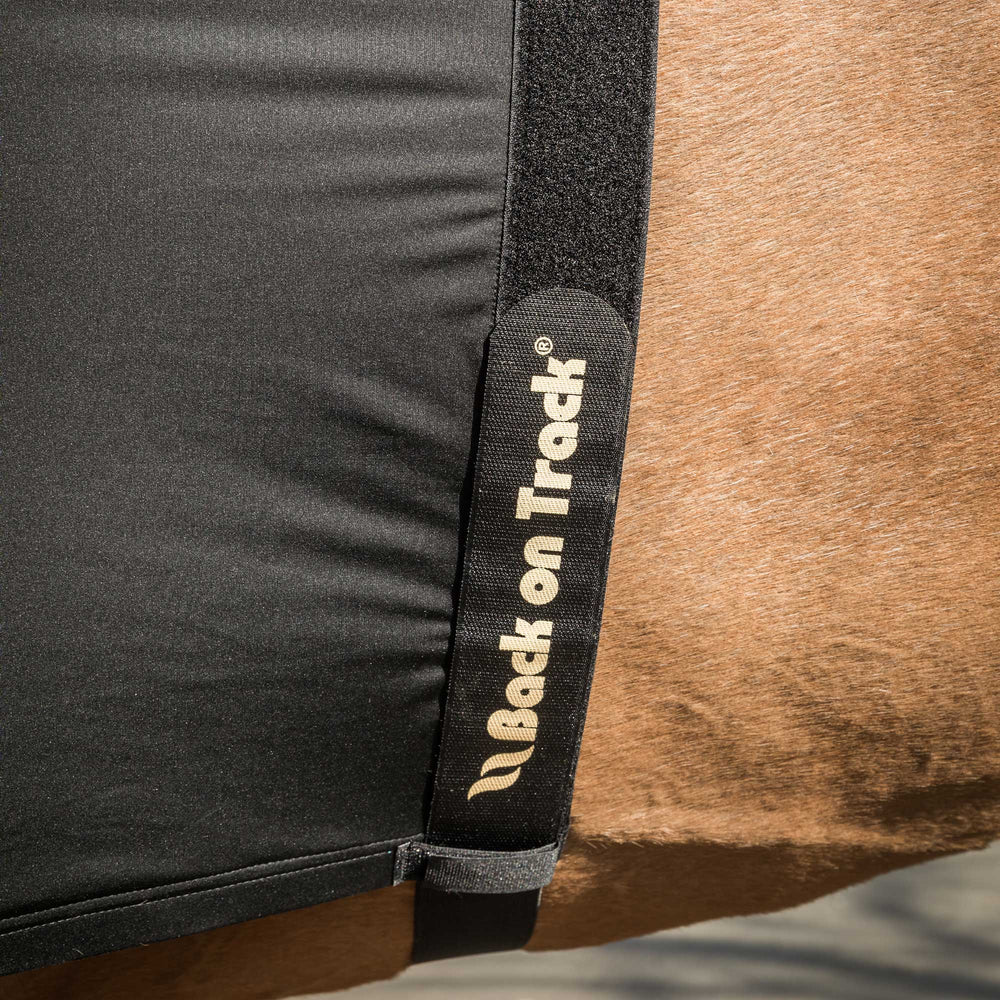 Back on Track Light Horse Shoulder Guard, repurposed for people, offers soothing support and far infrared therapy