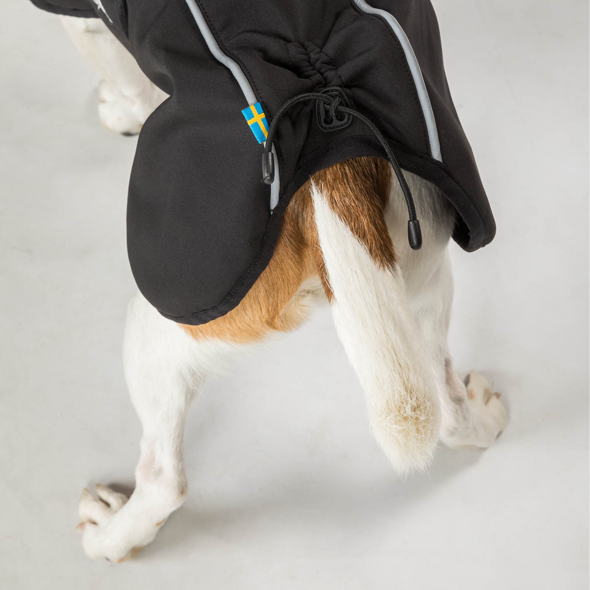 Bark Dog Coat with Iontex®, reflective trim, and ergonomic fit for high tail set dogs' comfort, mobility, and safety