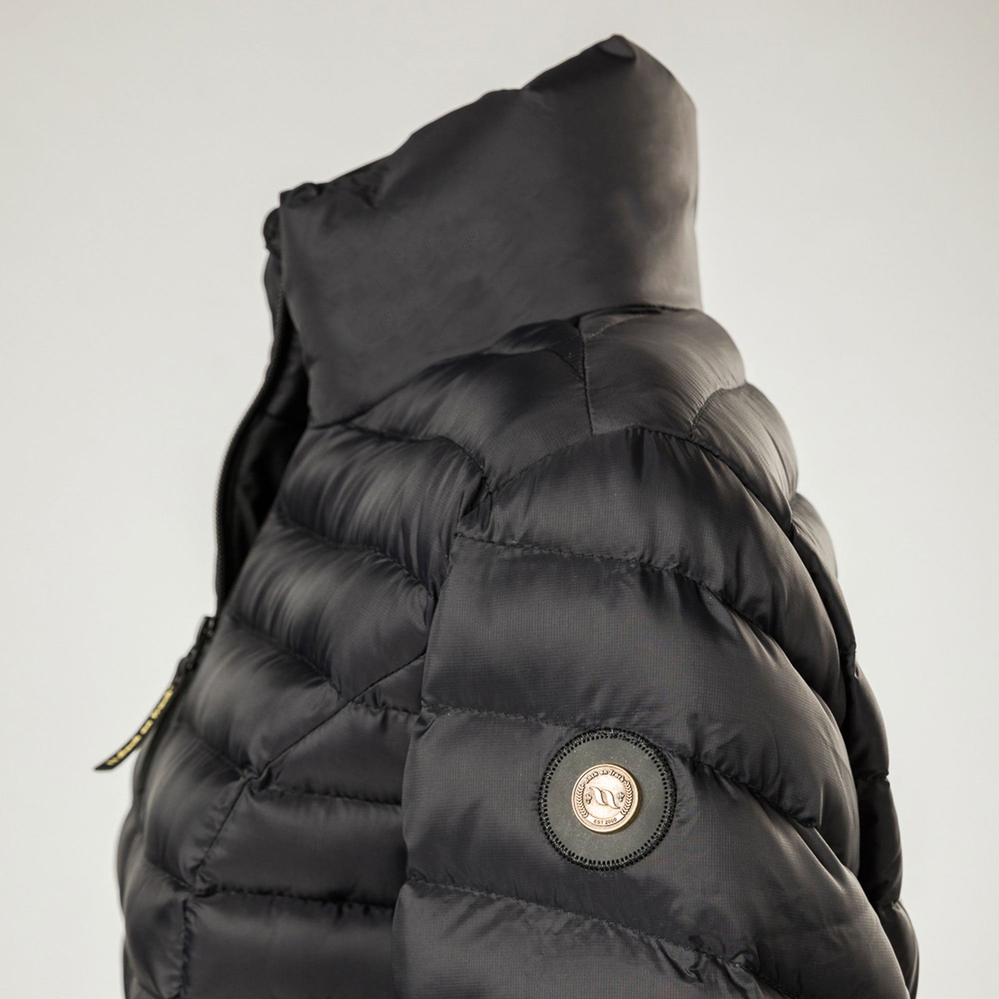Back on Track Grace women's puffer jacket with logo, Iontex® lining and Sorona® fill for warmth, comfort, and style