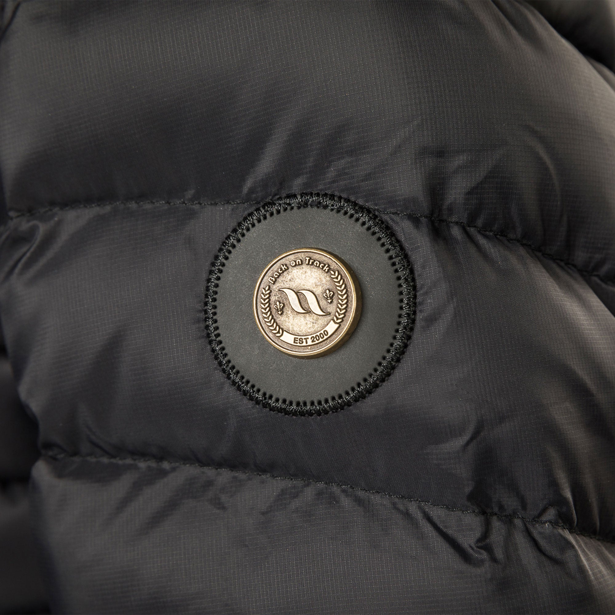 Back on Track Grace women's puffer jacket with logo, Iontex® lining and Sorona® fill for warmth, comfort, and style
