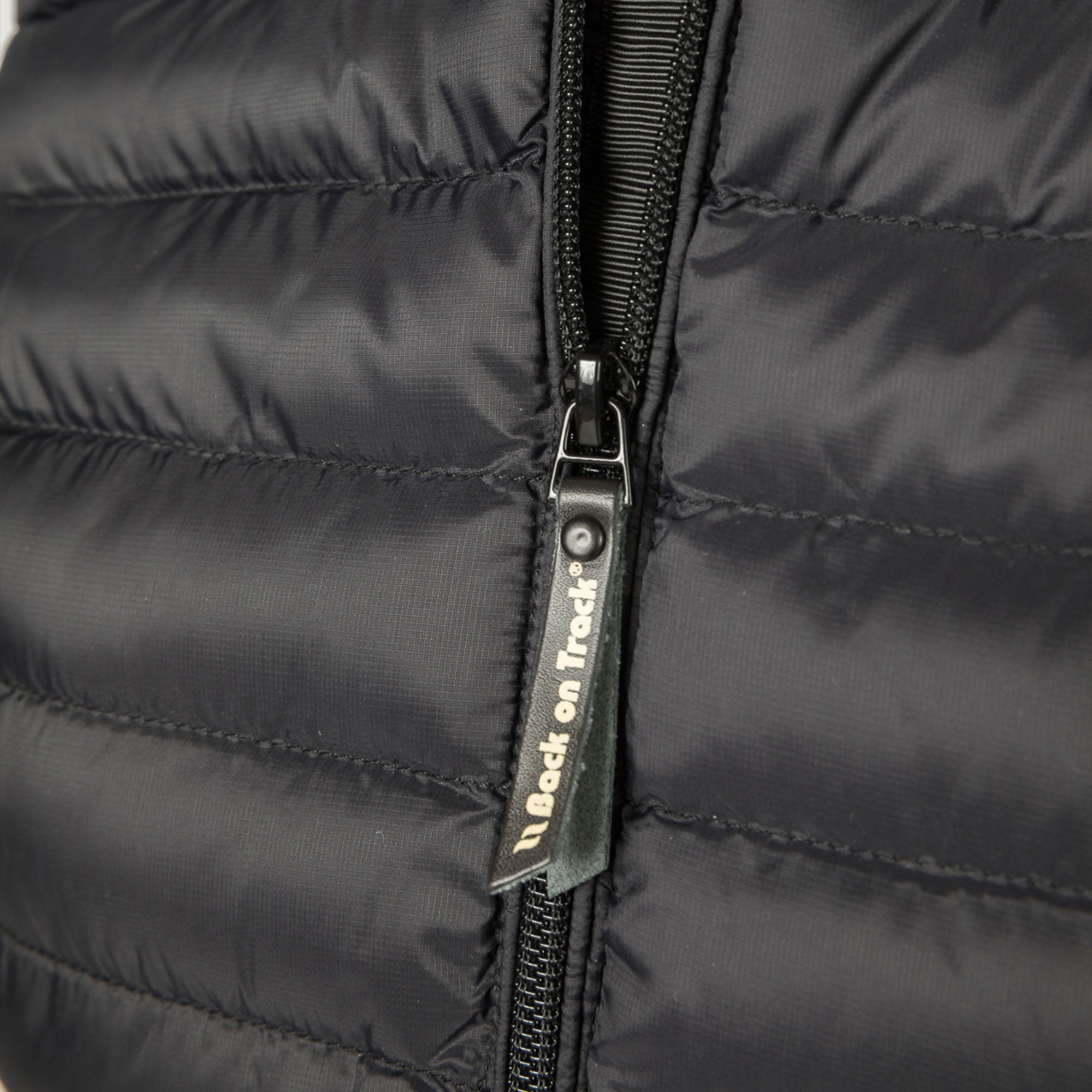 Back on Track Grace women's puffer jacket with logo, Iontex® lining and Sorona® fill for warmth, comfort, and style