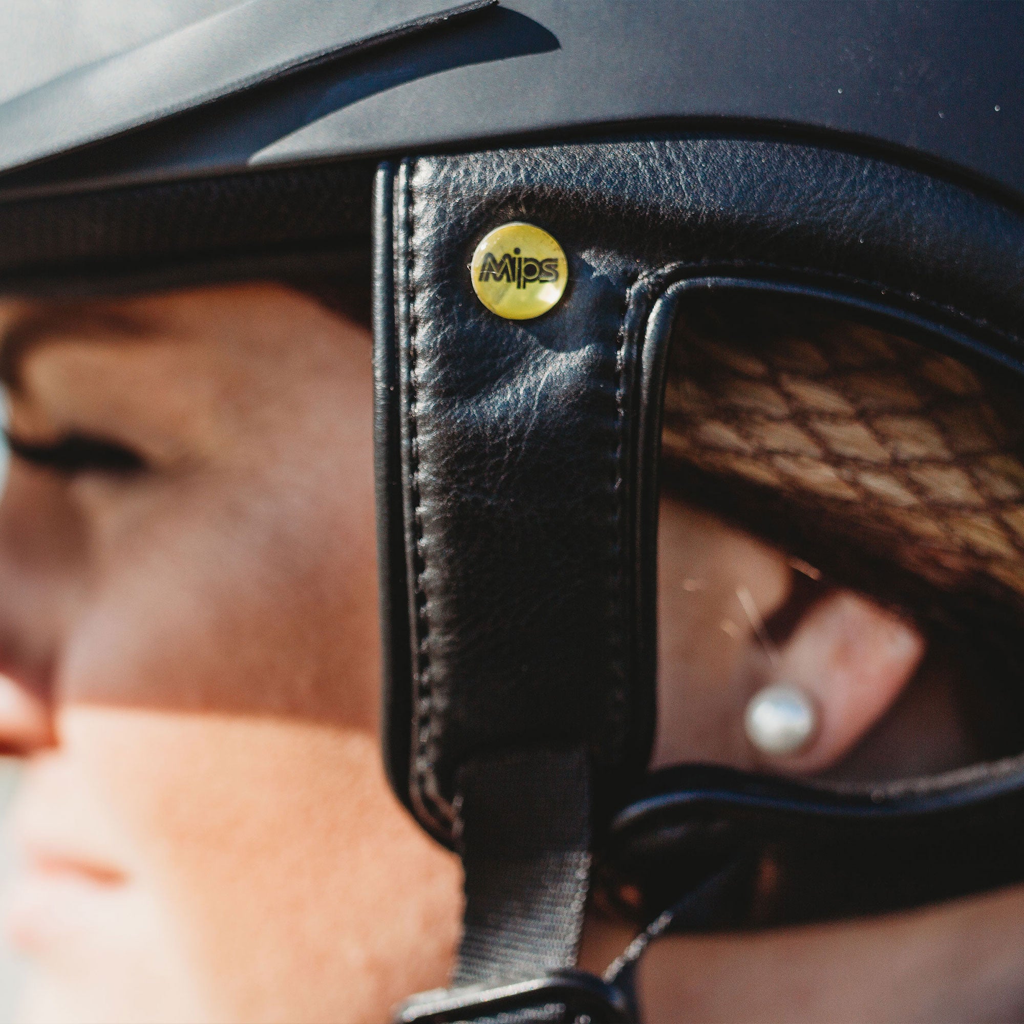 Back on Track Lynx smooth top riding helmet with sleek design, safety features, and infrared comfort lining